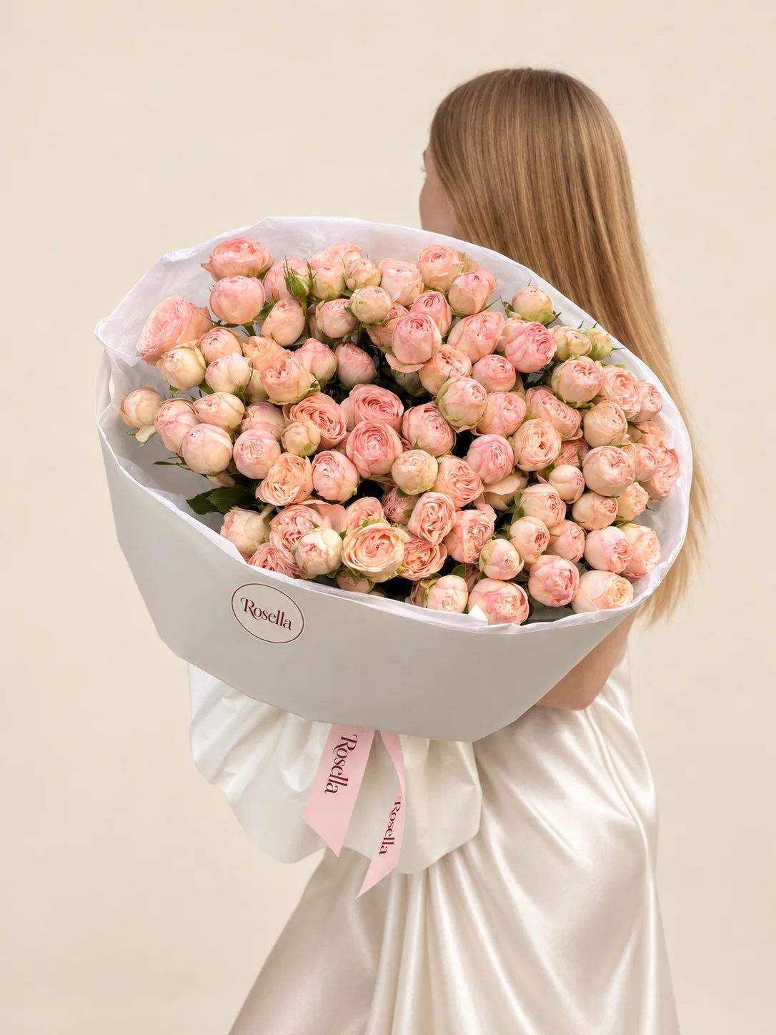 100 spray roses in a hand-tied bouquet