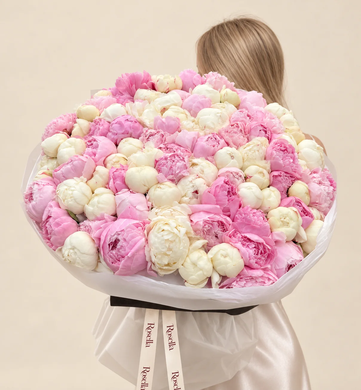56 white peonies & 49 pink peonies in a hand-tied bouquet