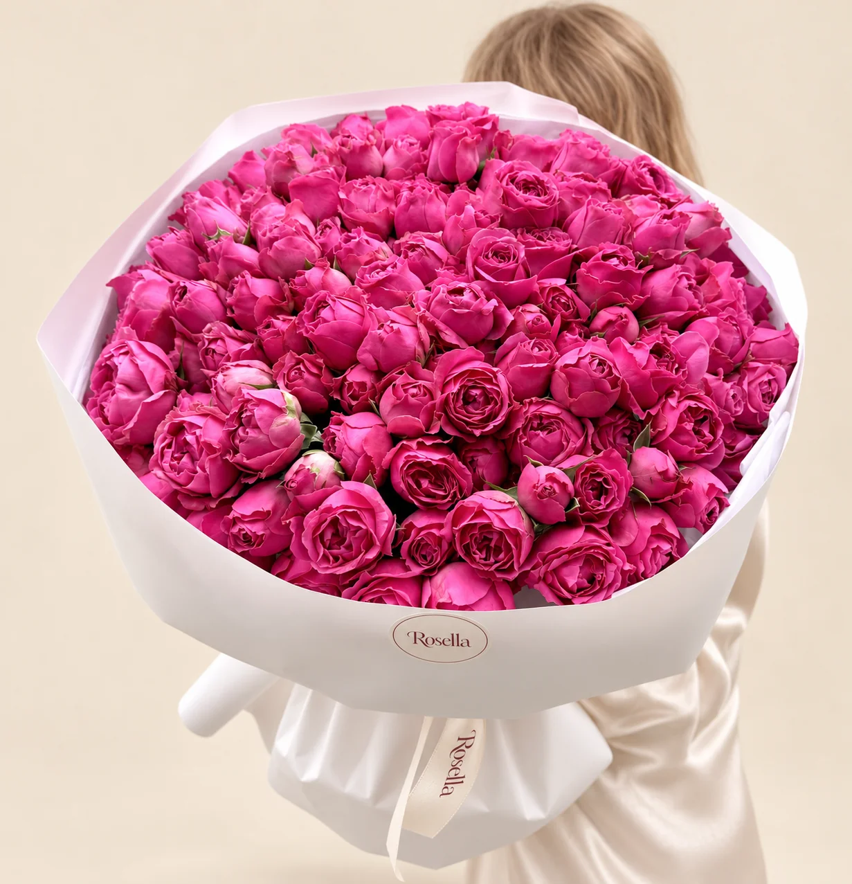 110 spray roses in a hand-tied bouquet