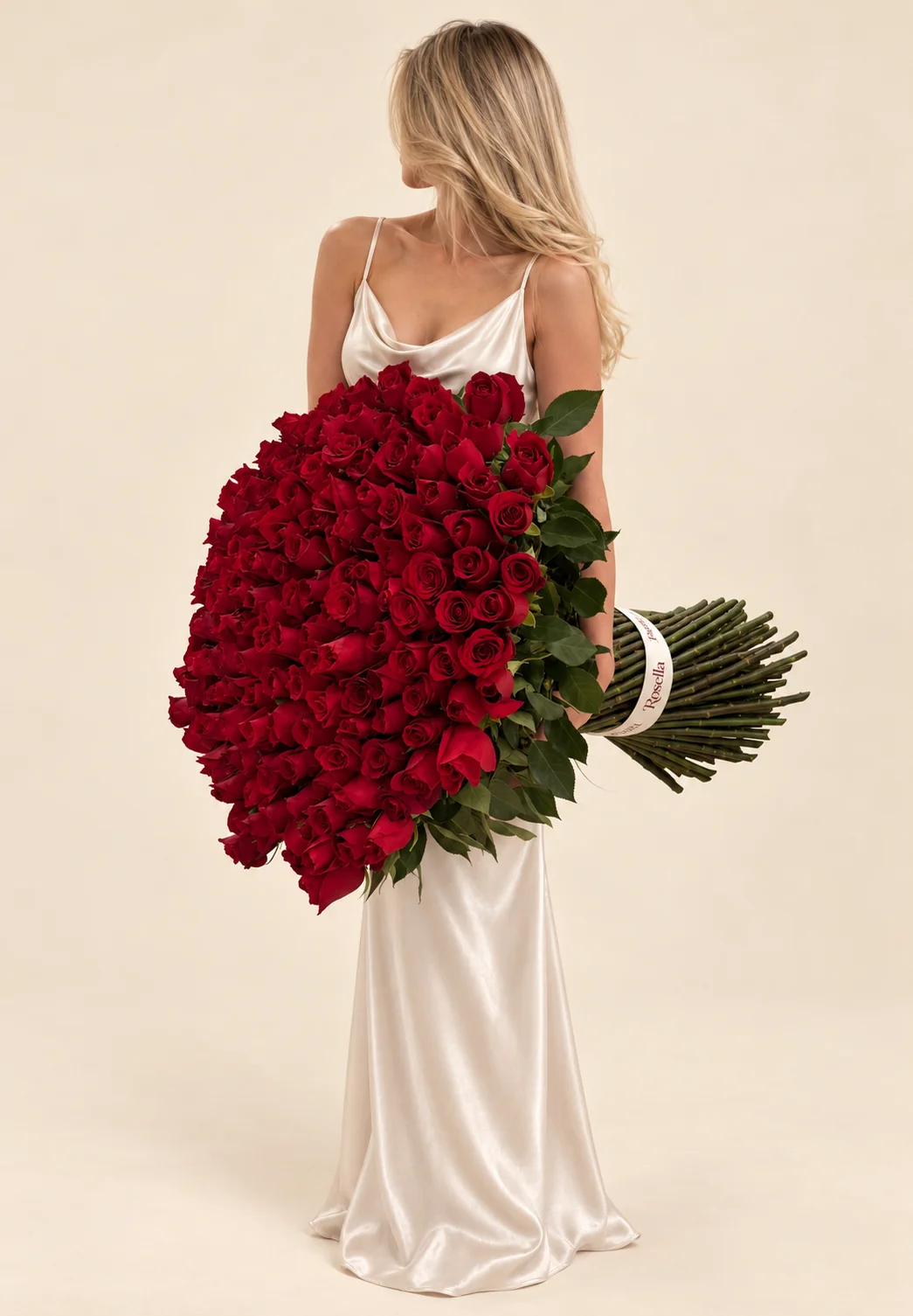 115 roses in a hand-tied bouquet