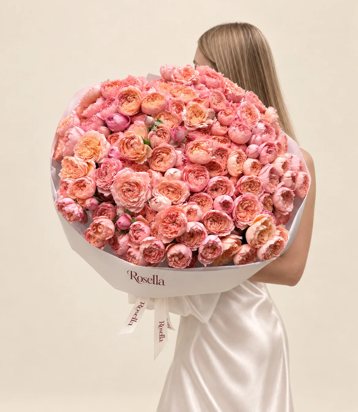 120 spray roses in a hand-tied bouquet