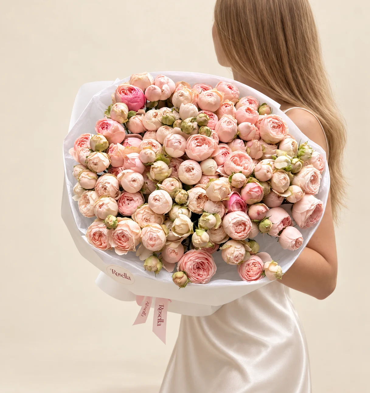 125 spray roses in a hand-tied bouquet