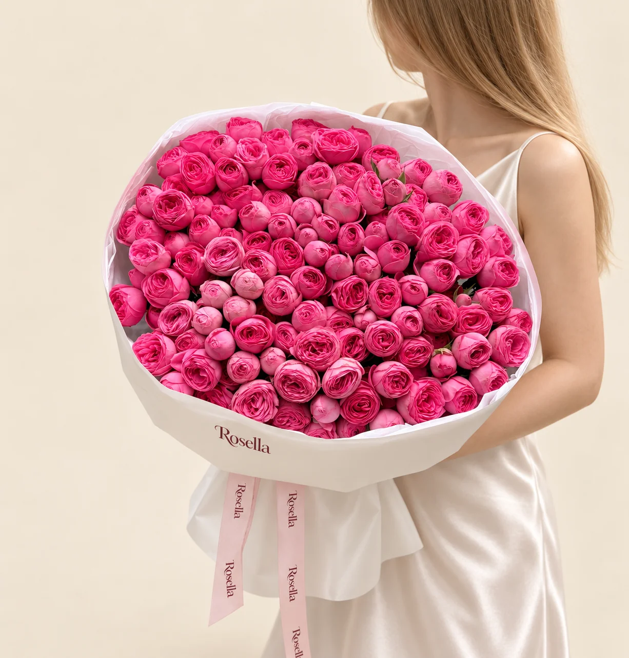 130 spray roses in a hand-tied bouquet