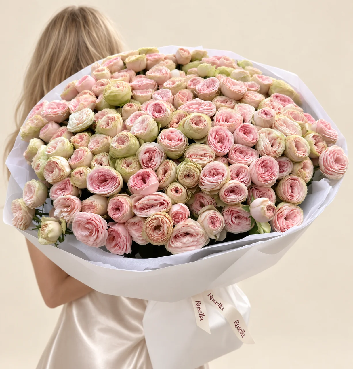 145 spray roses in a hand-tied bouquet