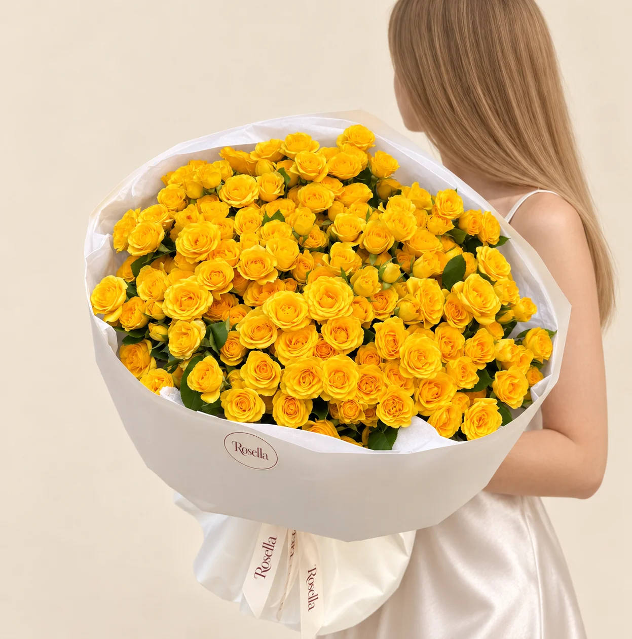 155 spray roses in a hand-tied bouquet