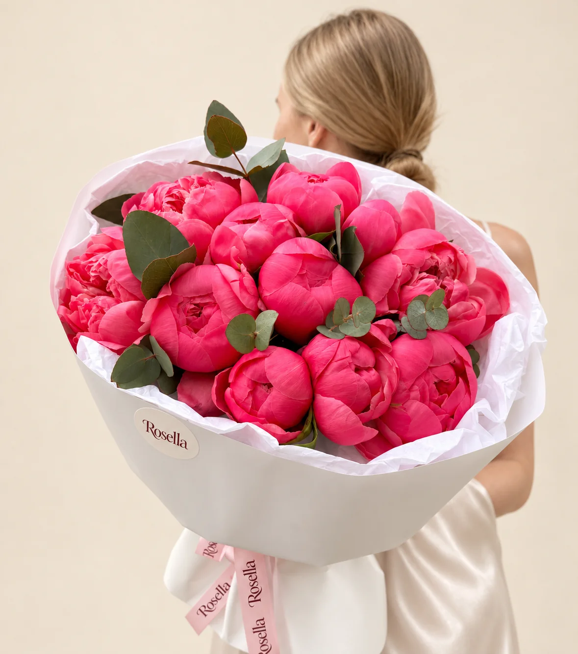 16 peonies in a hand-tied bouquet