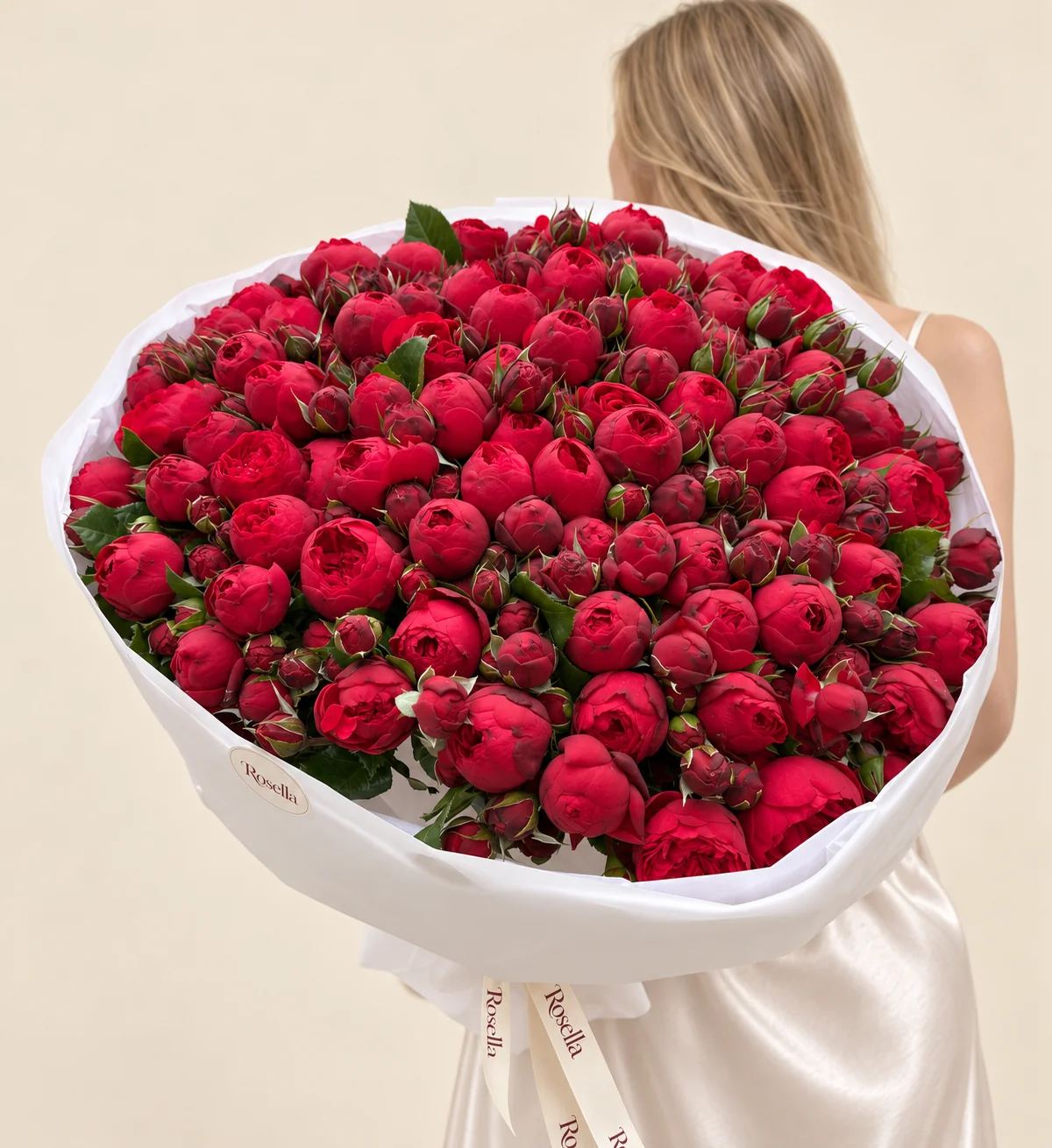 160 spray roses in a hand-tied bouquet