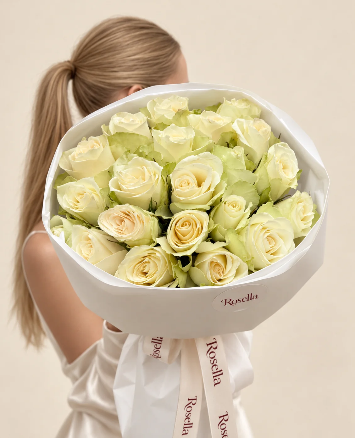 25 roses in a hand-tied bouquet