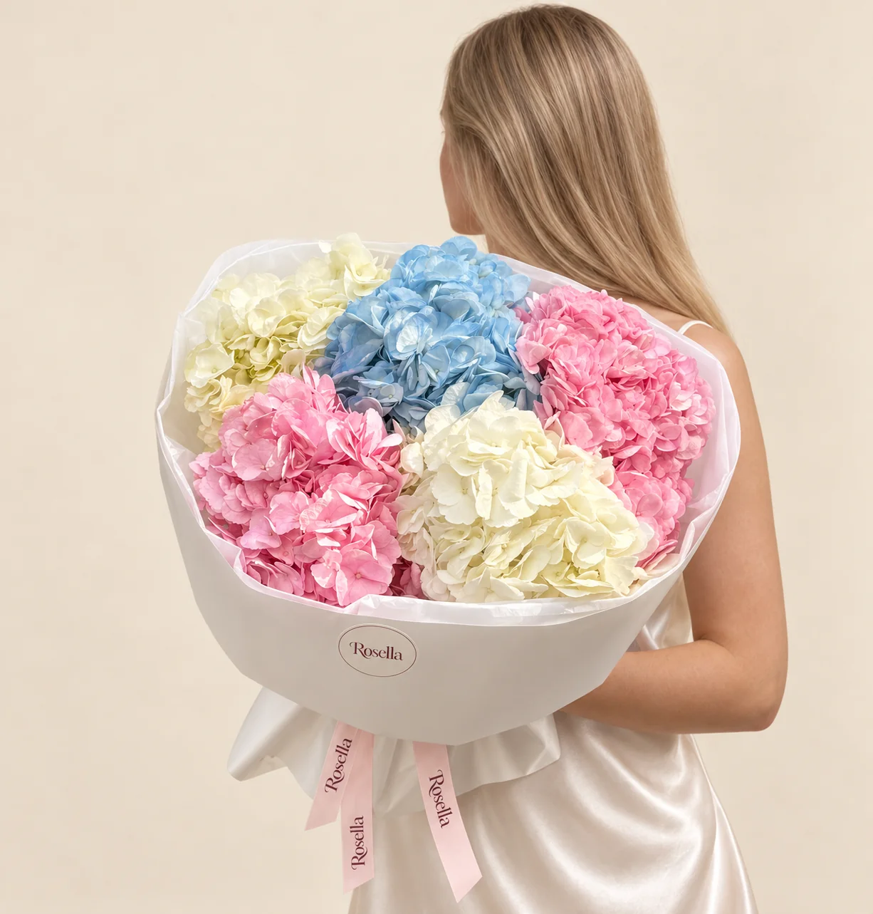 2 cream hydrangeas, 2 pink hydrangeas & 1 blue hydrangea in a hand-tied bouquet
