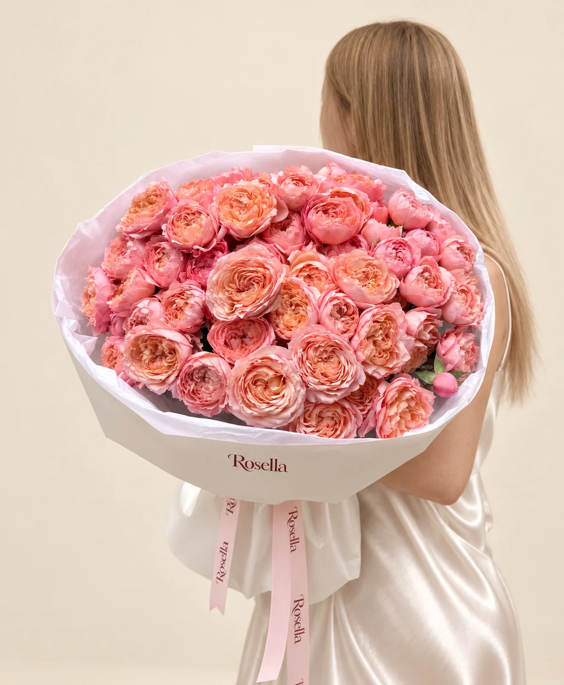 52 spray roses in a hand-tied bouquet