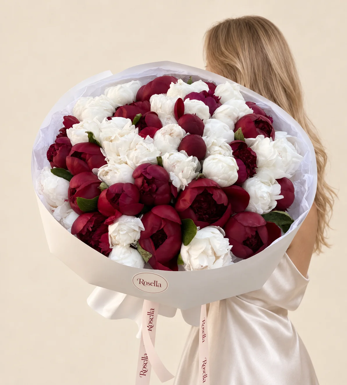 28 white peonies & 25 burgundy peonies in a hand-tied bouquet
