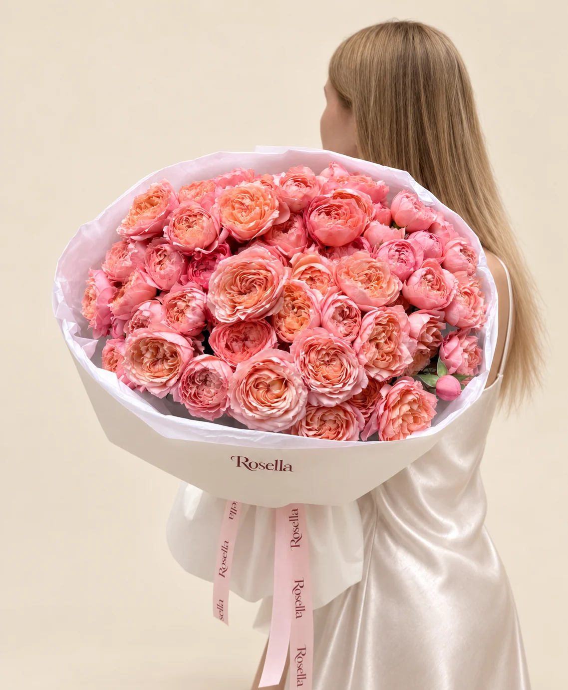 55 spray roses in a hand-tied bouquet