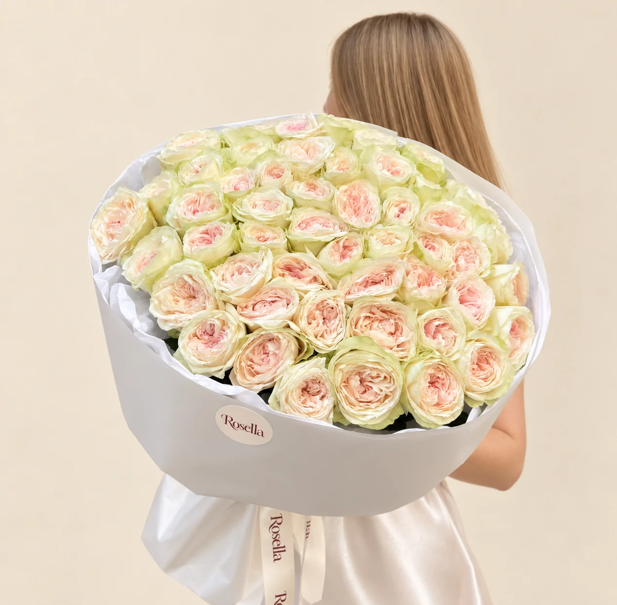 55 garden roses in a hand-tied bouquet
