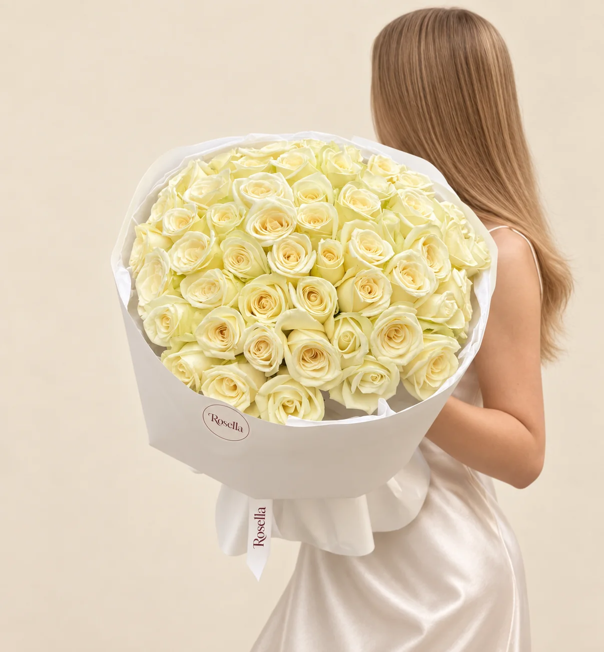 57 roses in a hand-tied bouquet