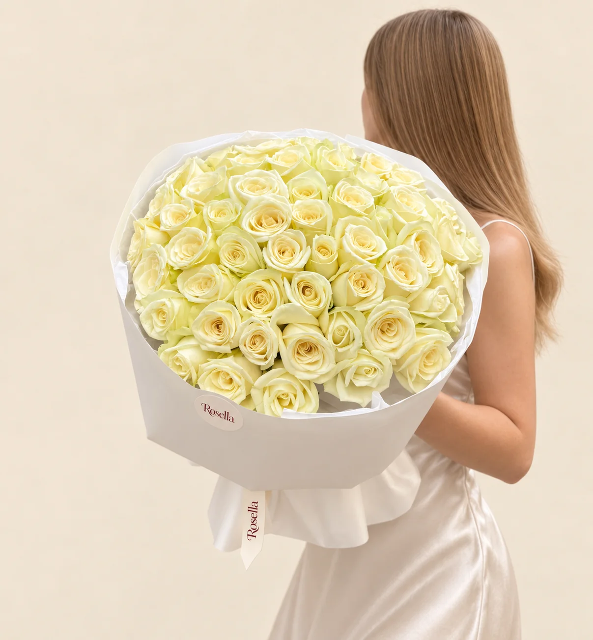 60 roses in a hand-tied bouquet