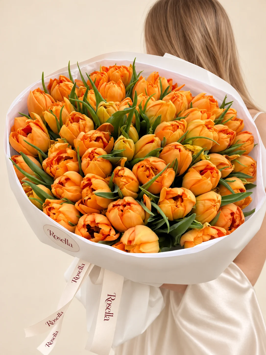 65 tulips in a hand-tied bouquet