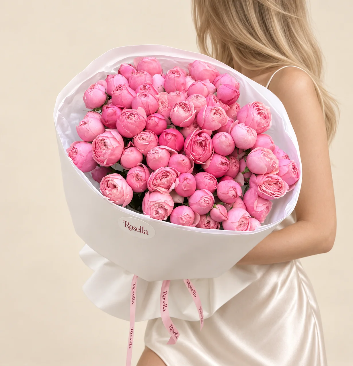 70 roses in a hand-tied bouquet