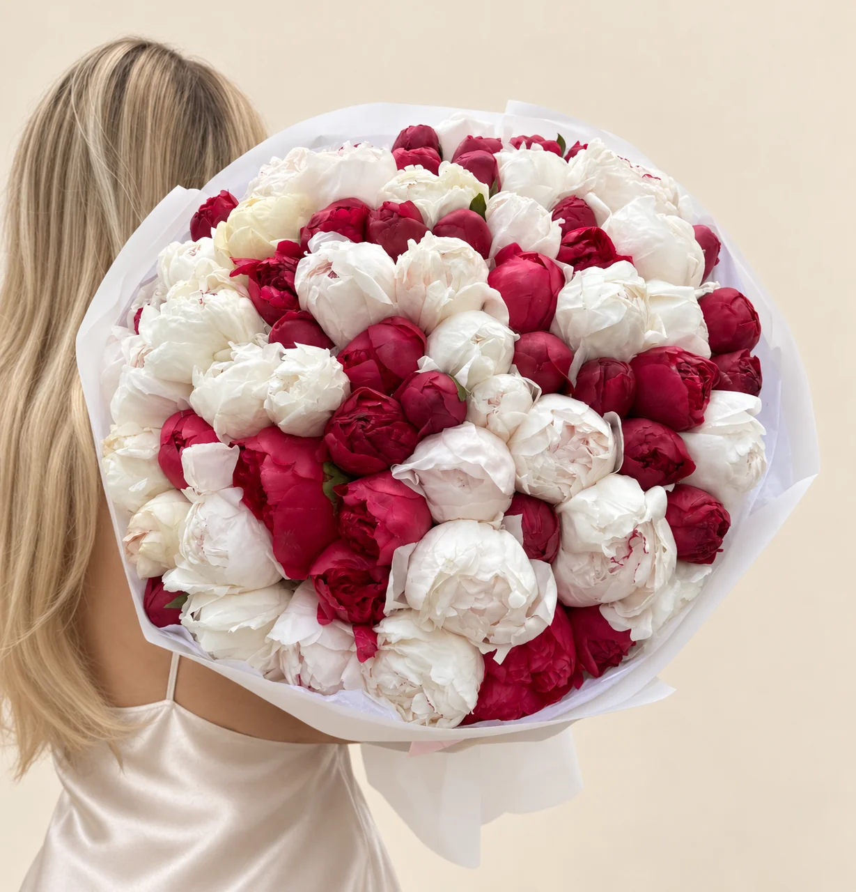 42 burgundy peonies & 39 white peonies in a hand-tied bouquet