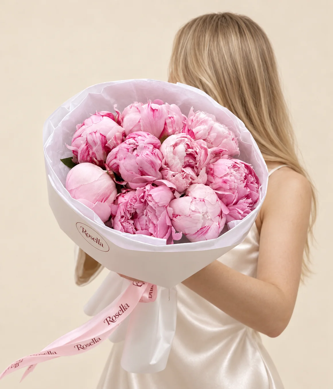 9 peonies in a hand-tied bouquet
