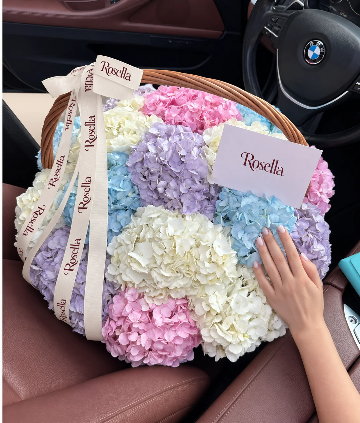 6 white hydrangeas, 5 blue hydrangeas, 5 lavender hydrangeas & 4 pink hydrangeas in a basket