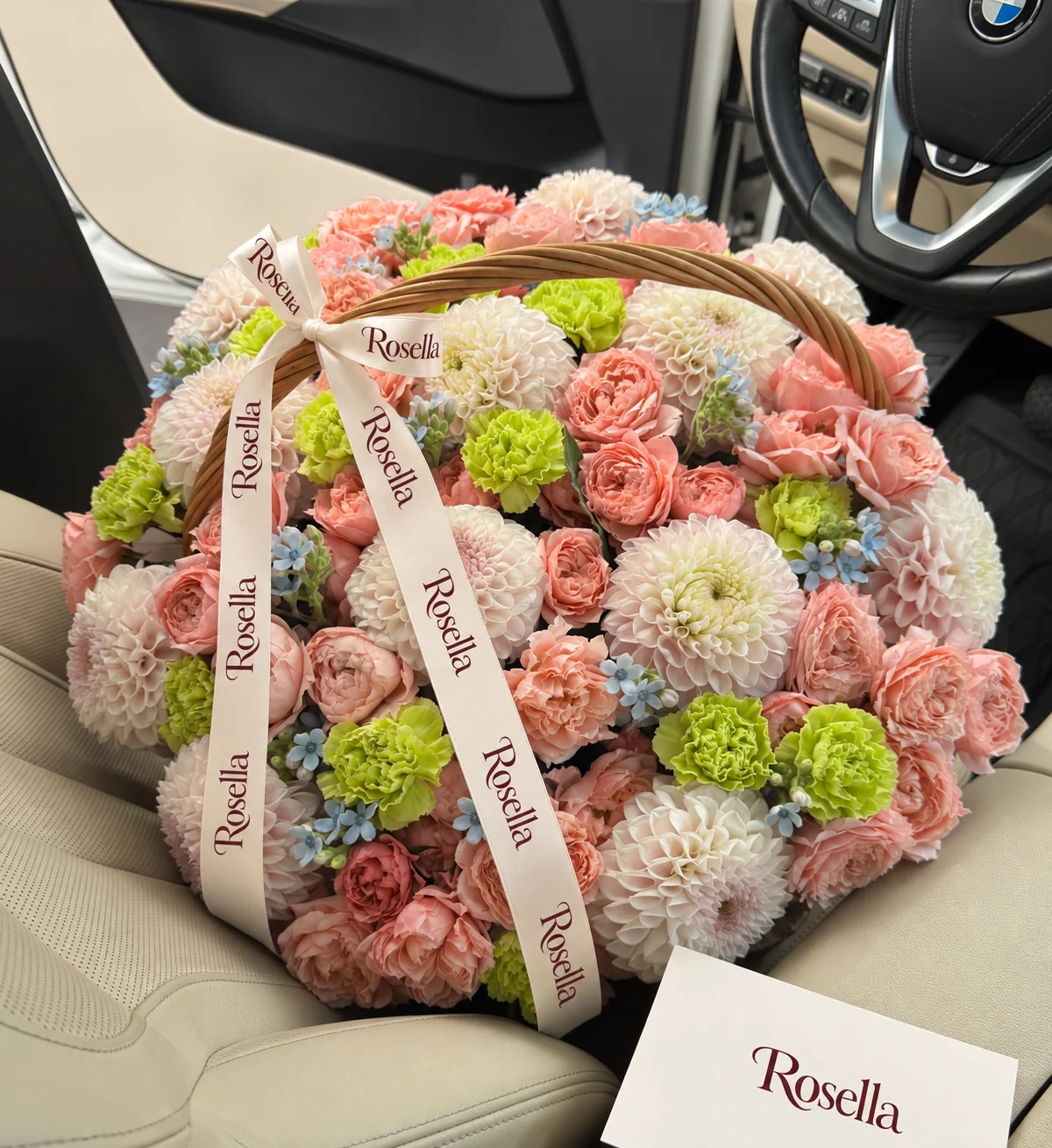 15 dahlias, 48 spray roses, 15 carnations & 34 tweedia blooms in a basket