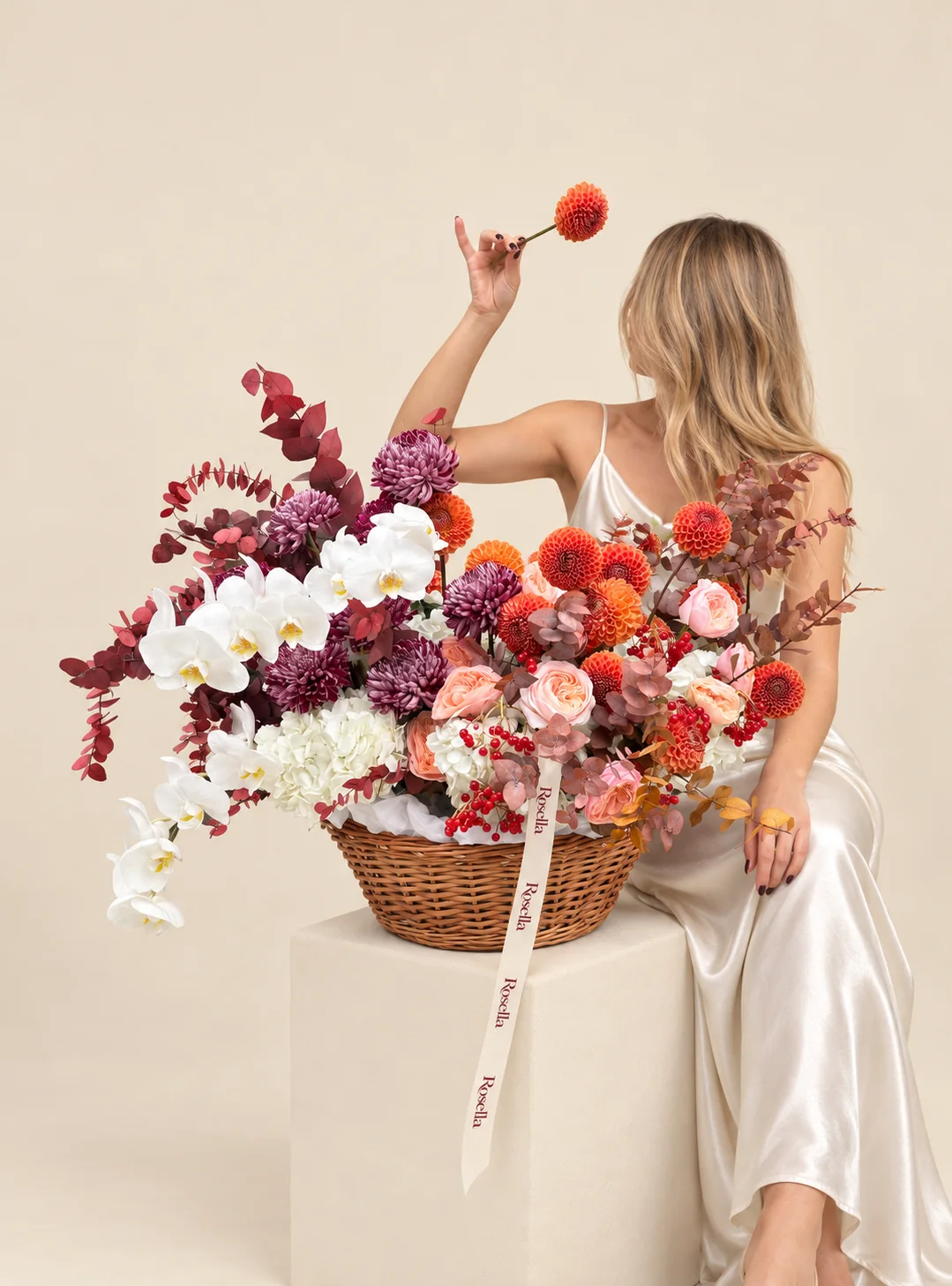 11 garden roses, 10 coral dahlias, 4 hydrangeas, 11 chrysanthemums, 12 orchid blooms & 4 orange dahlias in a basket