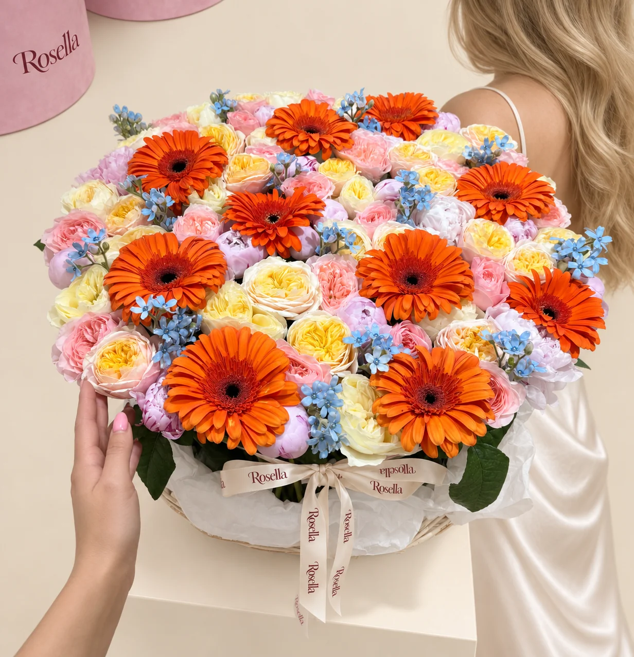 38 cream garden roses, 22 peach garden roses, 18 peonies, 125 tweedia blooms & 10 gerberas in a basket