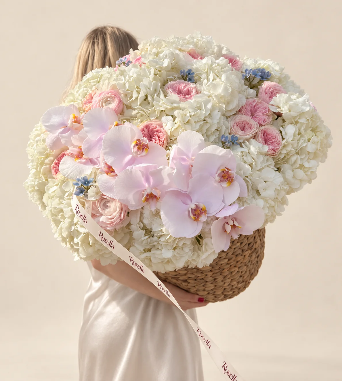 16 hydrangeas, 17 garden roses, 10 orchid blooms & 24 tweedia blooms in a basket