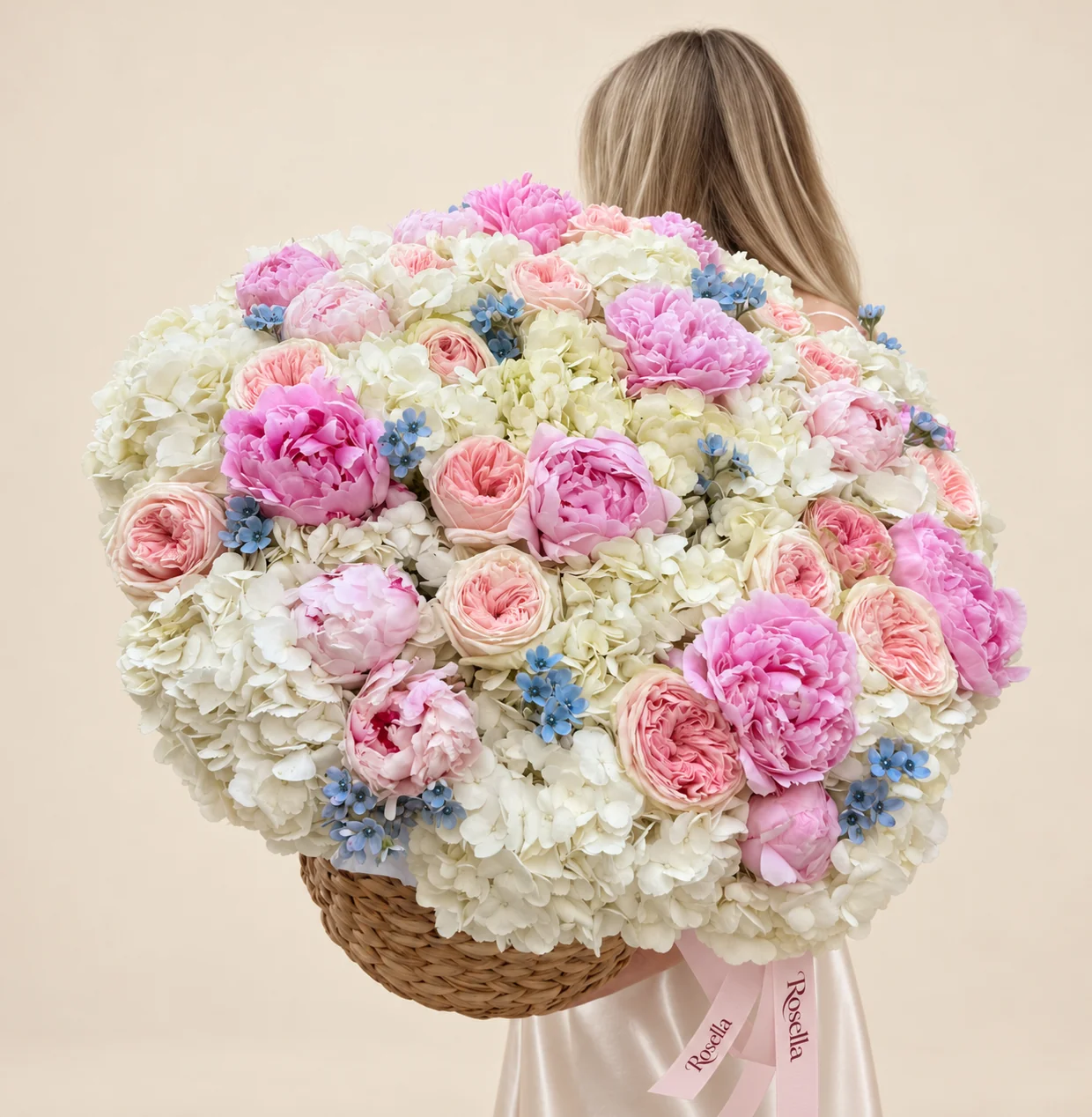 22 hydrangeas, 18 garden roses, 10 pink peonies, 9 pink peonies & 75 tweedia blooms in a basket
