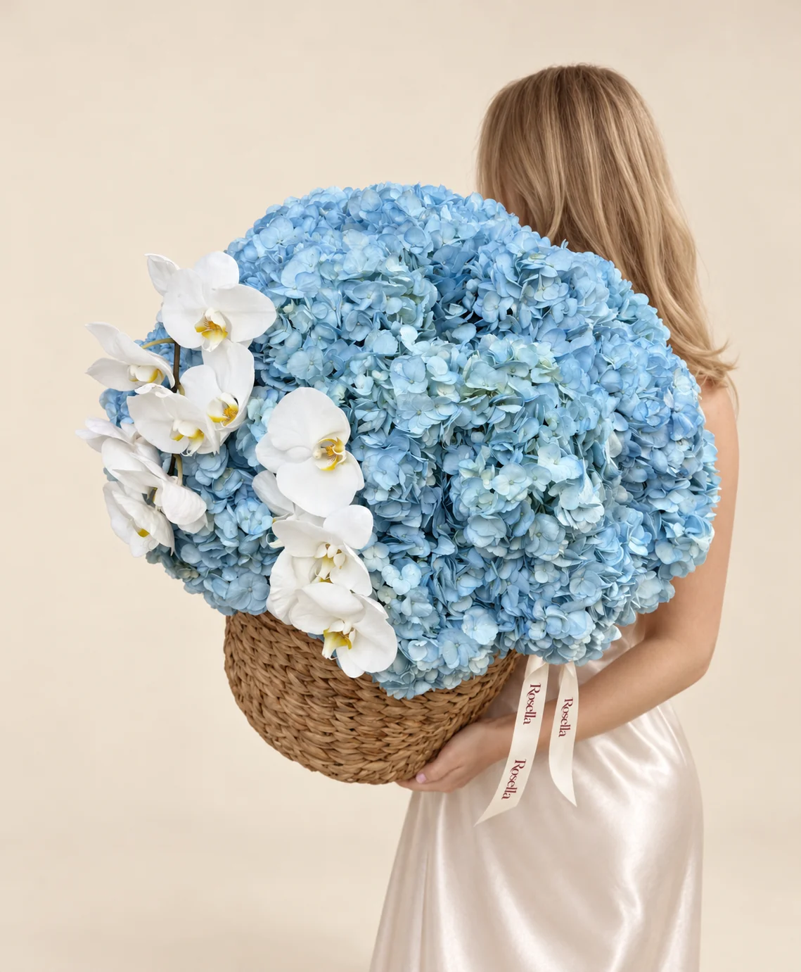 20 hydrangeas & 10 orchid blooms in a basket