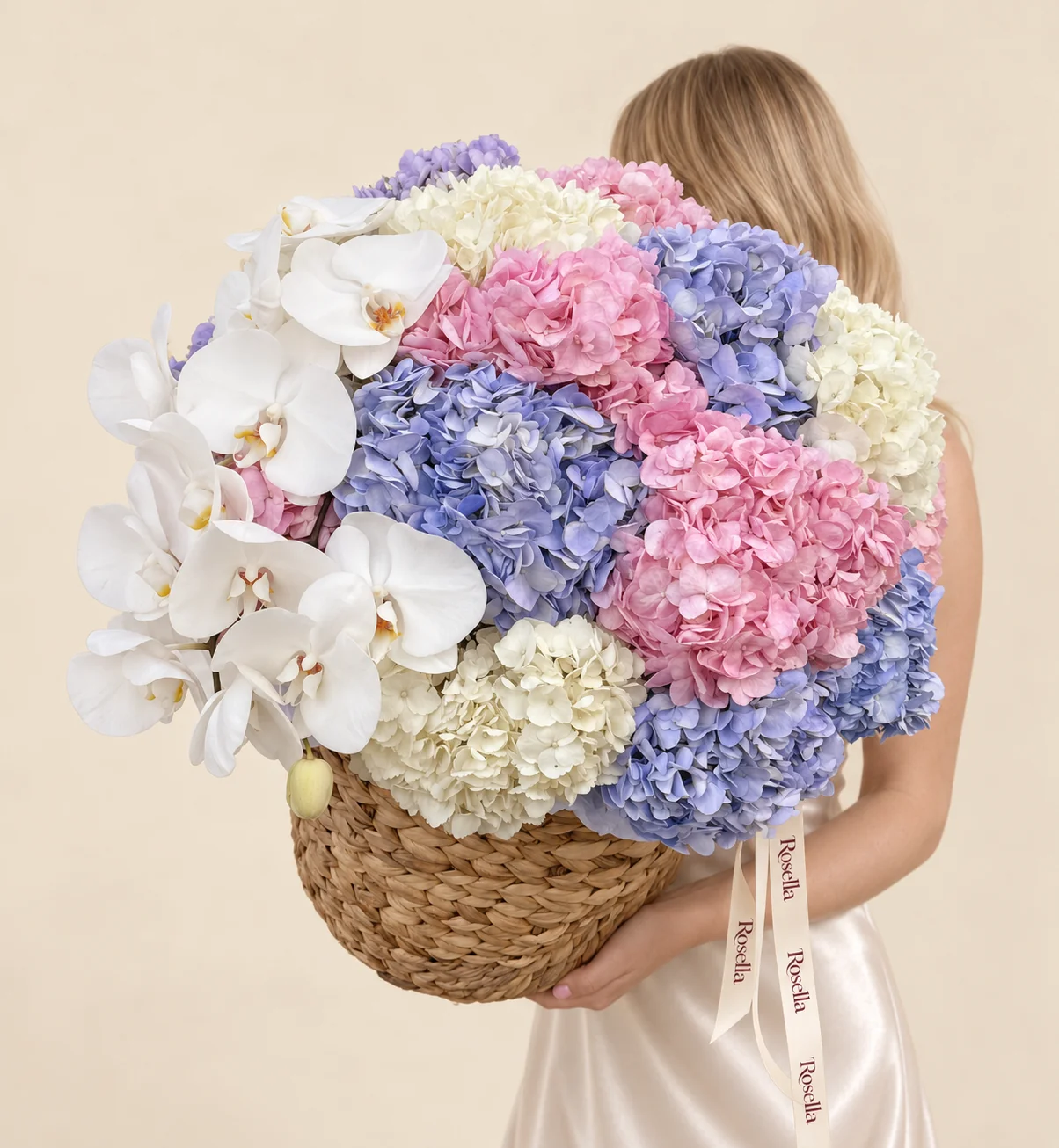 7 pink hydrangeas, 7 lavender hydrangeas, 4 white hydrangeas & 11 orchid blooms in a basket