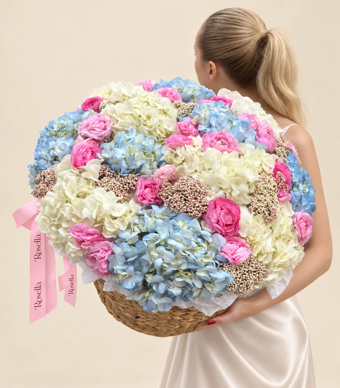 10 blue hydrangeas, 10 white hydrangeas, 17 pink ranunculus & 7 pink ranunculus in a basket