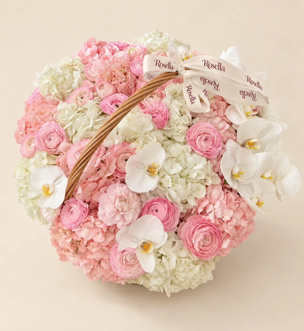 10 white hydrangeas, 9 pink hydrangeas, 23 ranunculus & 12 orchid blooms in a basket