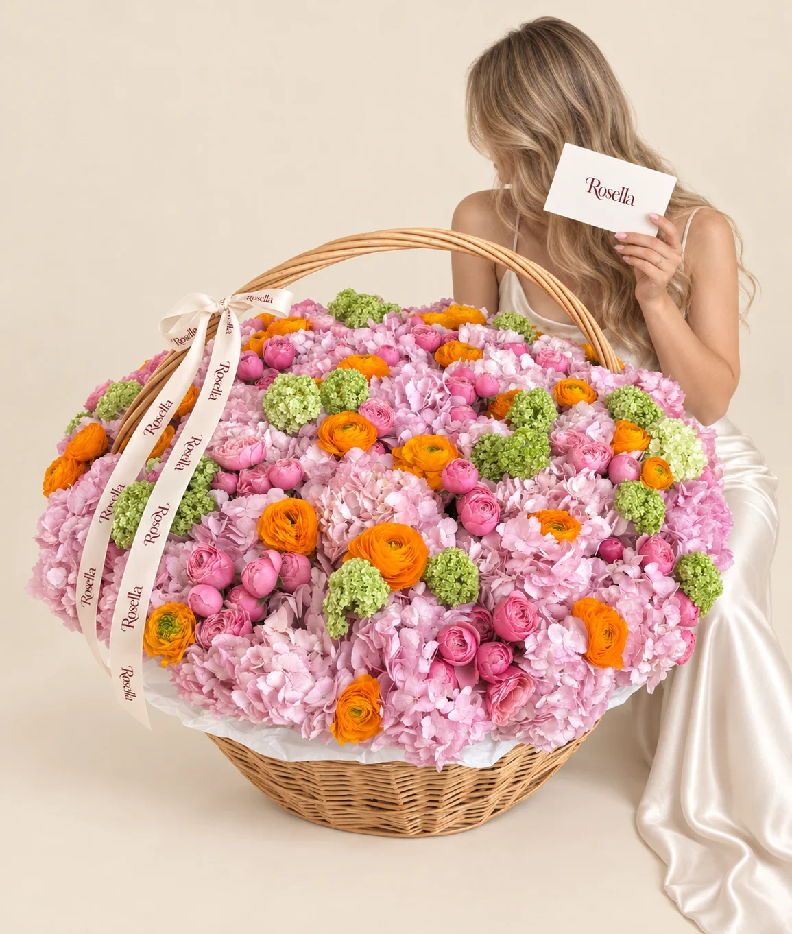 28 hydrangeas, 30 ranunculus & 46 spray roses in a basket