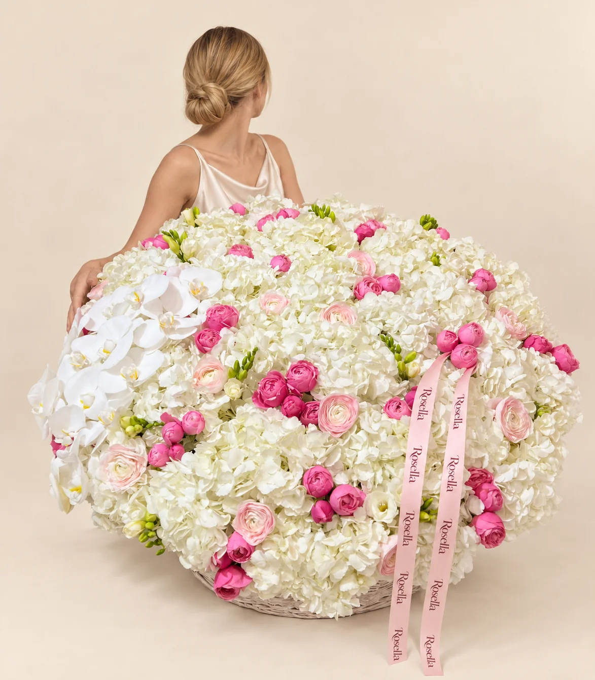 38 hydrangeas, 52 pink ranunculus, 14 blush ranunculus, 14 orchid blooms & 8 freesias in a basket