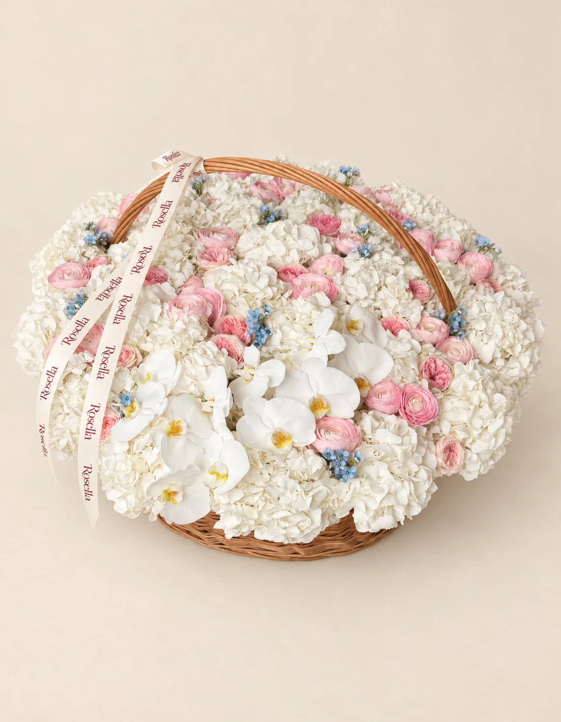 30 hydrangeas, 46 ranunculus, 70 tweedia blooms & 12 orchid blooms in a basket