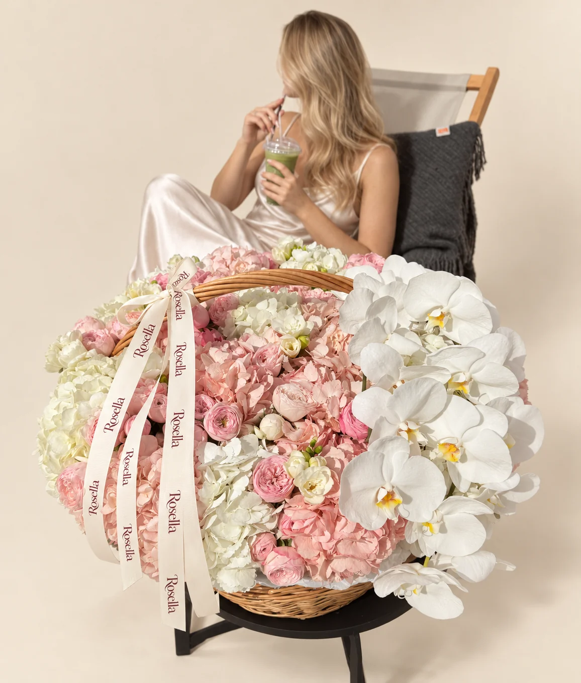 7 blush hydrangeas, 6 white hydrangeas, 25 pink spray roses, 14 orchid blooms, 7 blush spray roses & 4 freesias in a basket