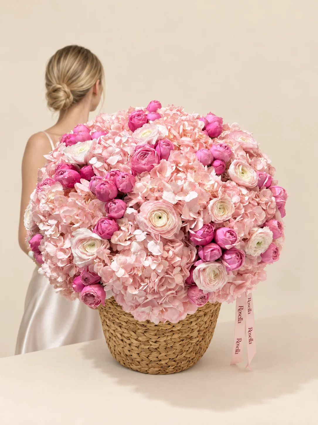 16 hydrangeas, 48 spray roses & 12 ranunculus in a basket