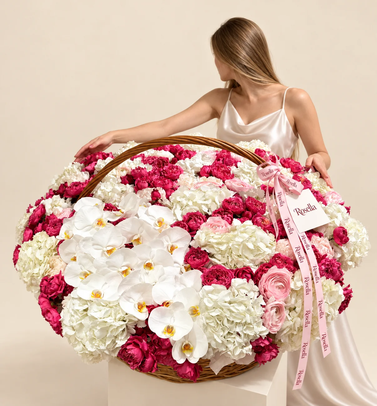 25 hydrangeas, 100 spray roses, 21 orchid blooms & 13 ranunculus in a basket