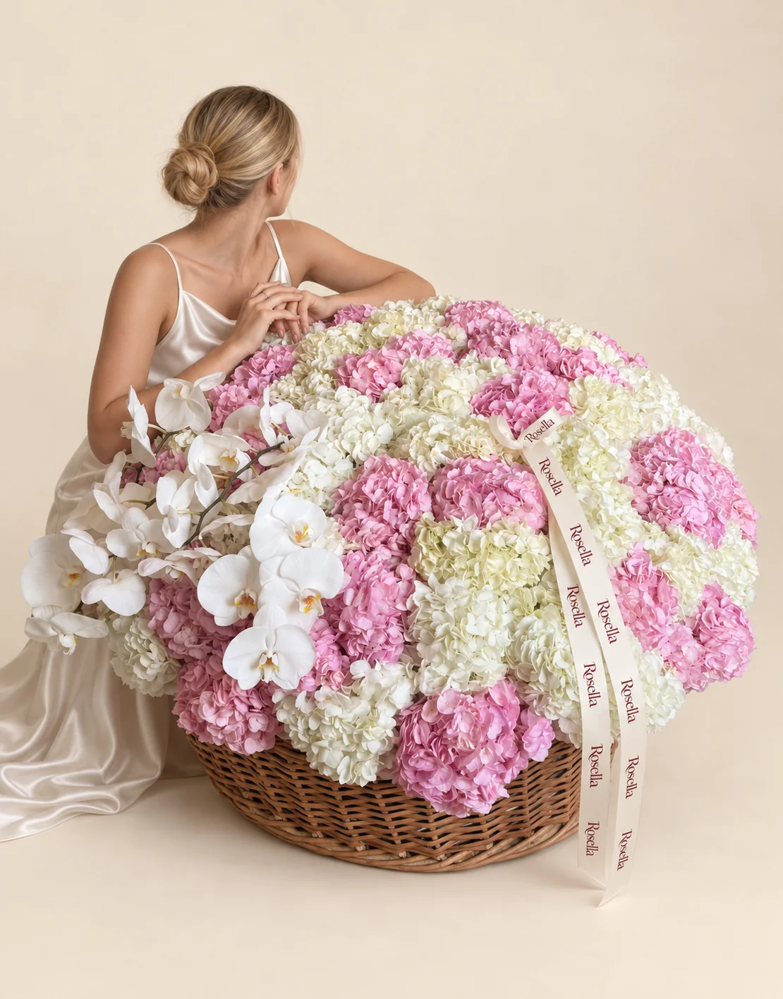 33 white hydrangeas, 31 pink hydrangeas & 22 orchid blooms in a basket