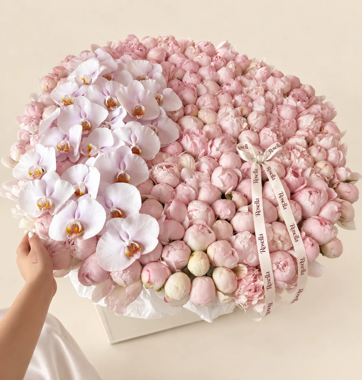 200 peonies & 24 orchid blooms in a basket
