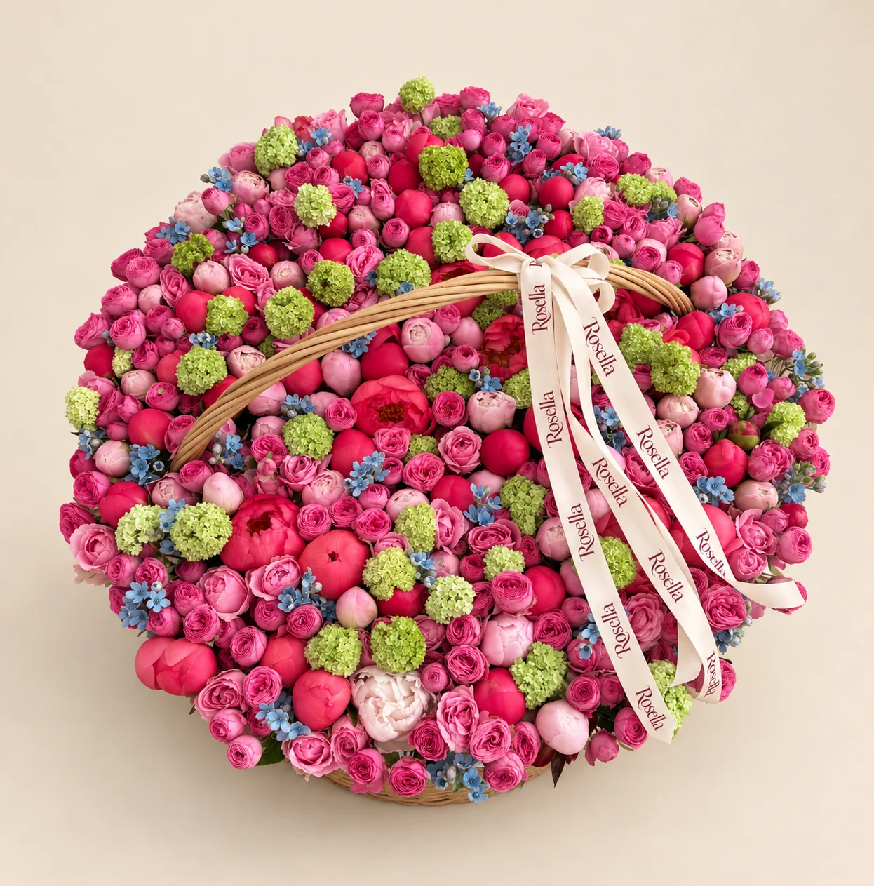 55 blush peonies, 54 coral peonies, 235 spray roses & 175 tweedia blooms in a basket