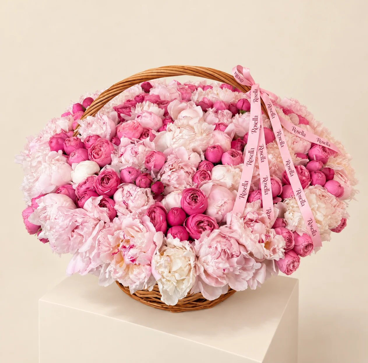 44 blush peonies, 84 spray roses & 10 ivory peonies in a basket