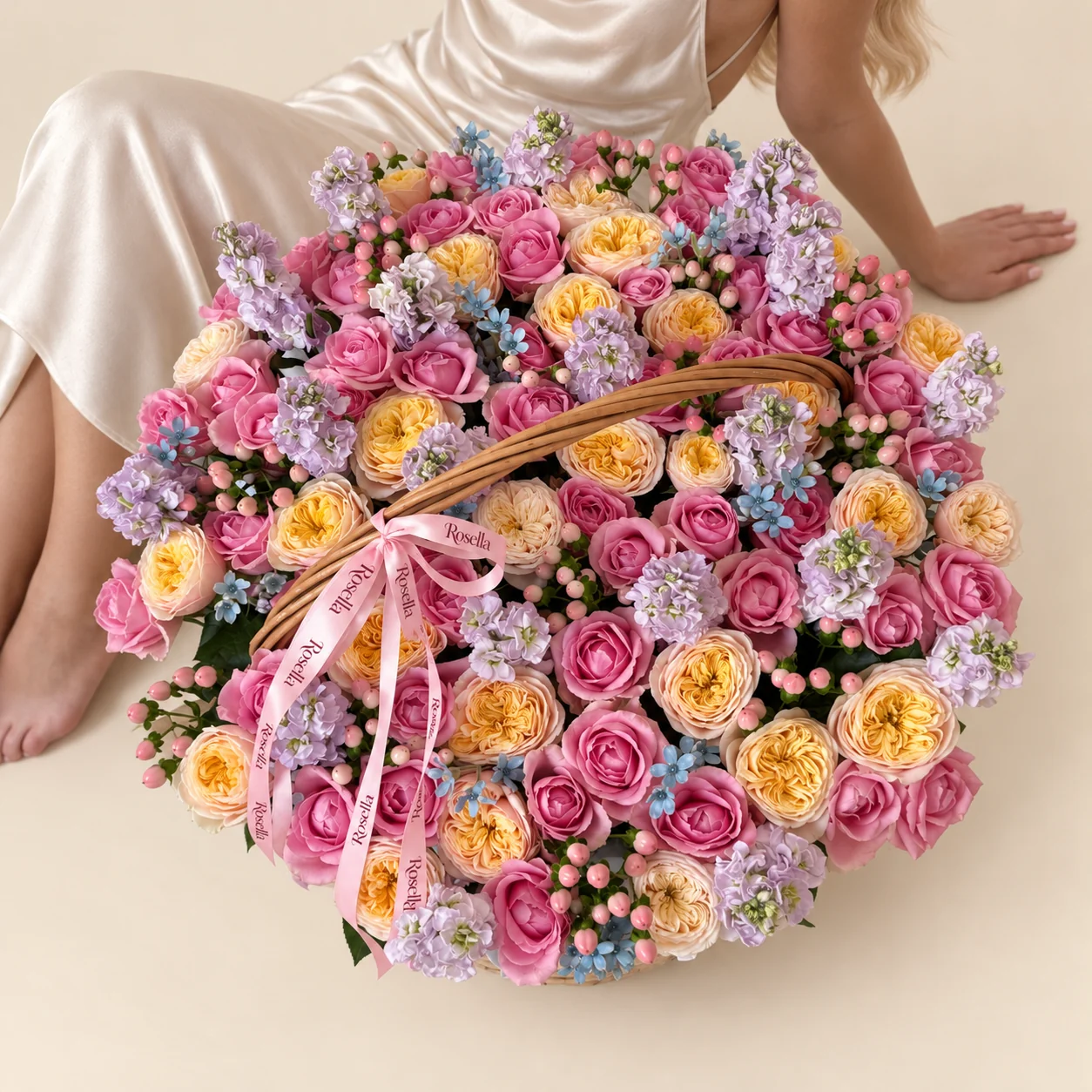 55 roses, 32 garden roses, 13 stocks & 40 tweedia blooms in a basket