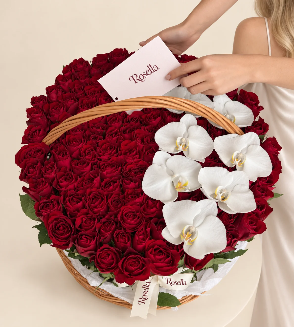 115 roses & 7 orchid blooms in a basket