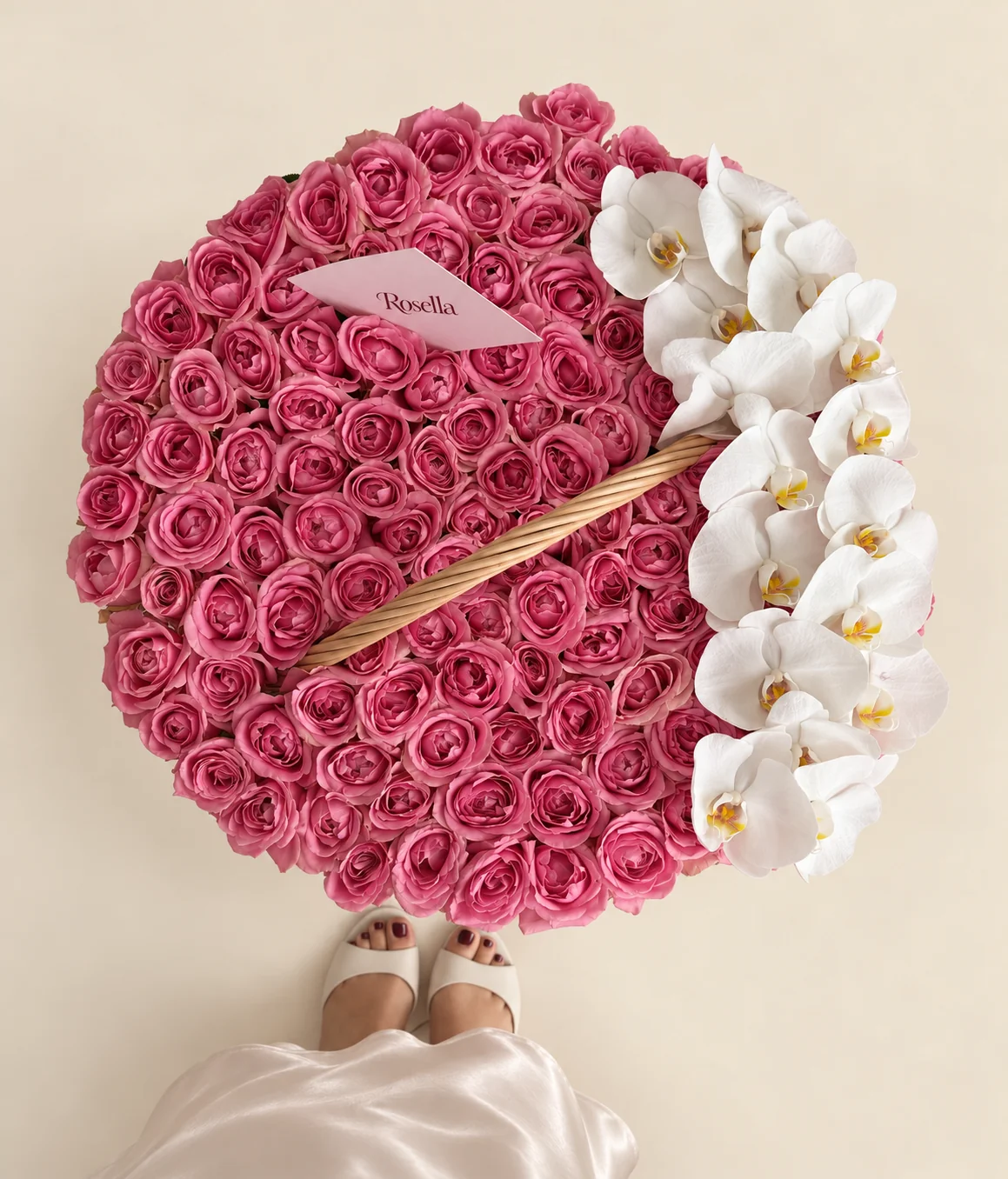 110 roses & 18 orchid blooms in a basket