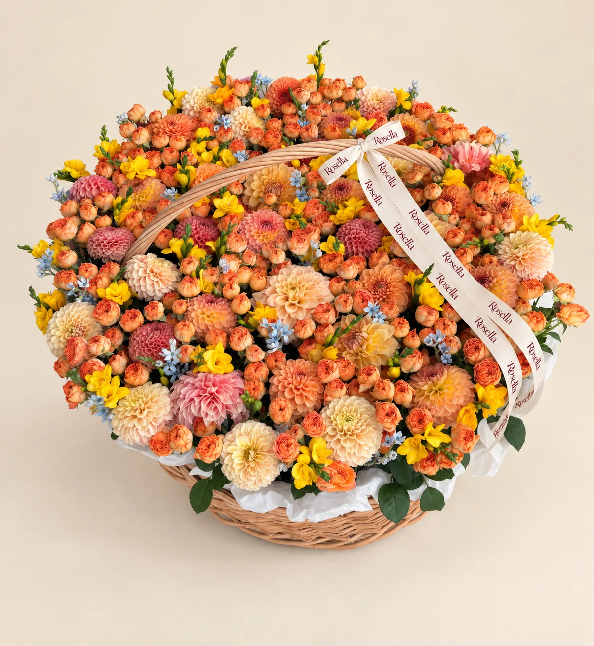210 spray roses, 14 cream dahlias, 12 orange dahlias, 27 freesias, 8 pink dahlias, 90 tweedia blooms & 7 yellow dahlias in a basket