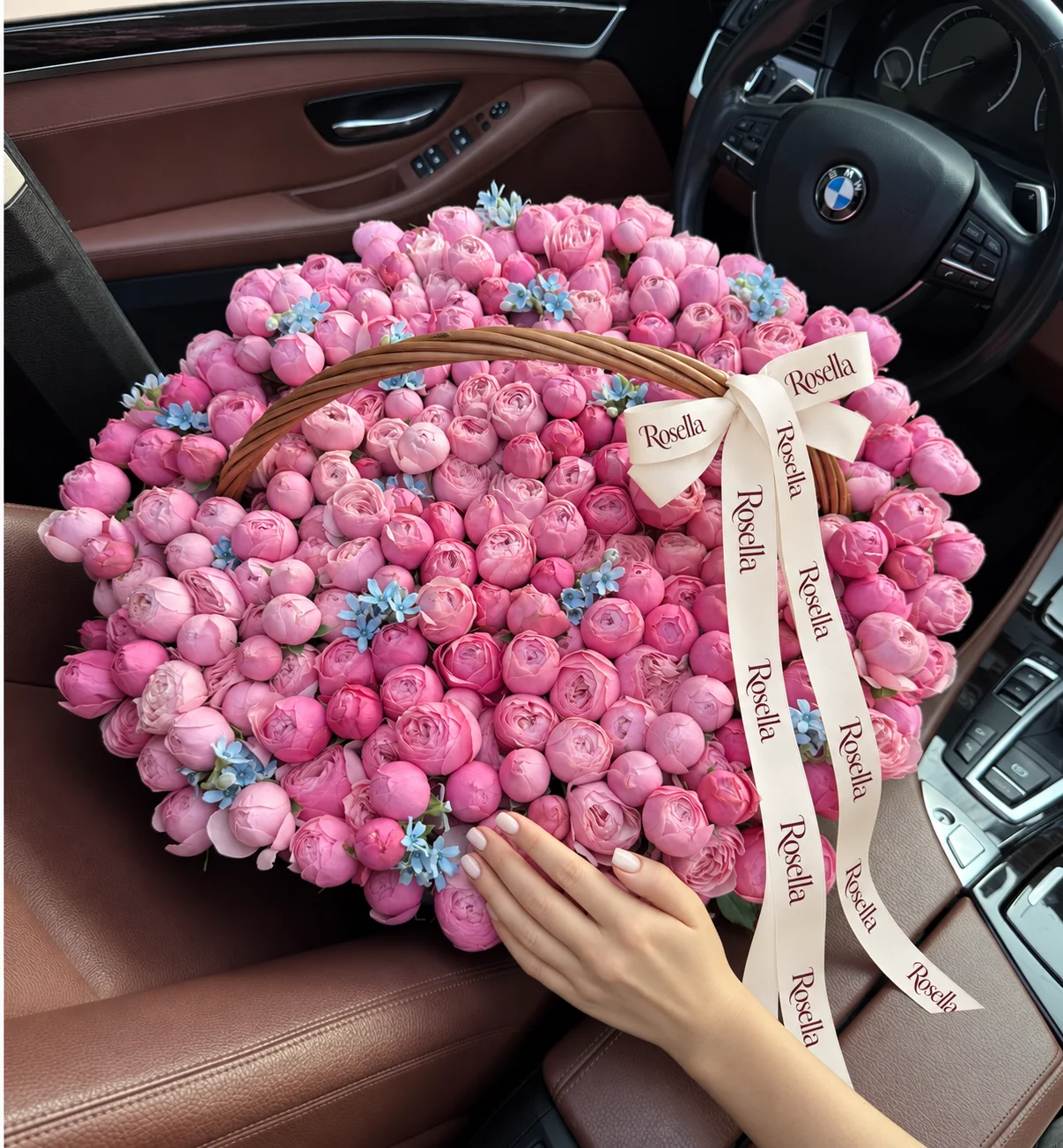 235 spray roses & 90 tweedia blooms in a basket
