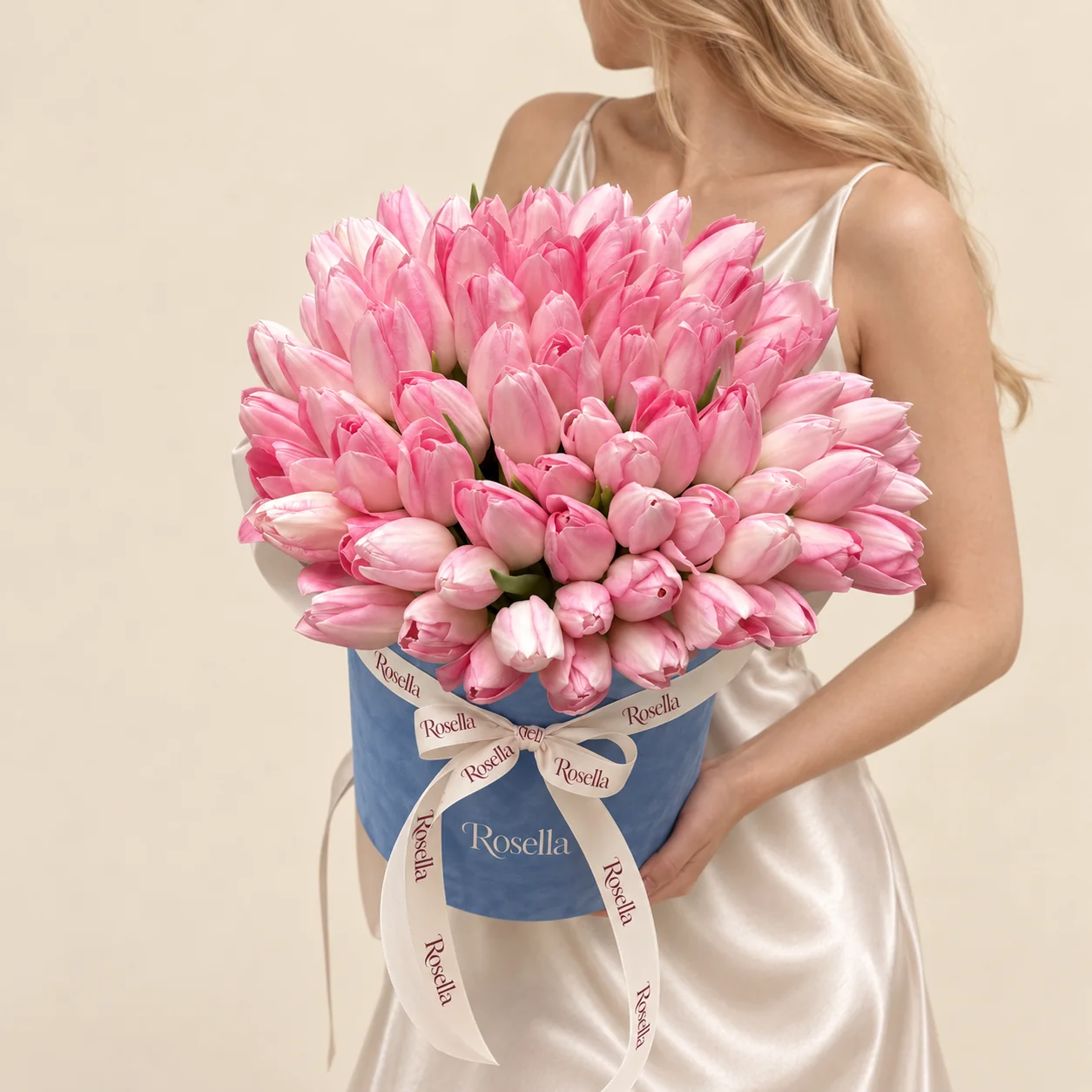 100 tulips in a round box