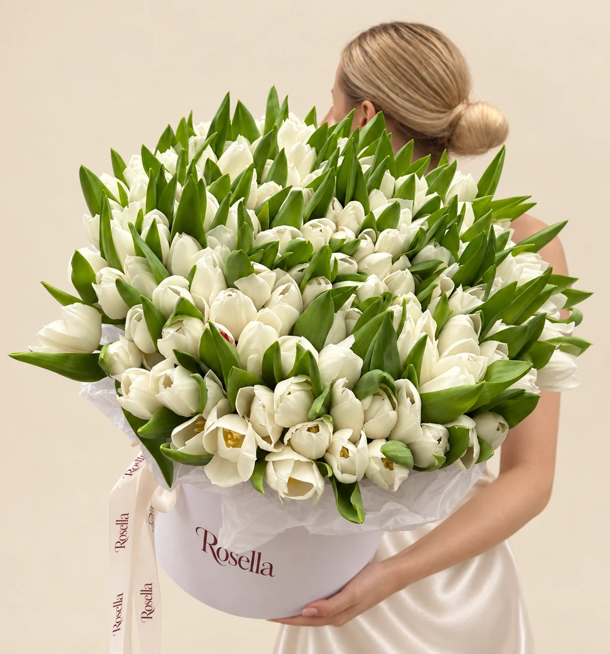 125 tulips in a round box